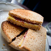 Homemade strawberry and pinot jam with cheddar sandwich